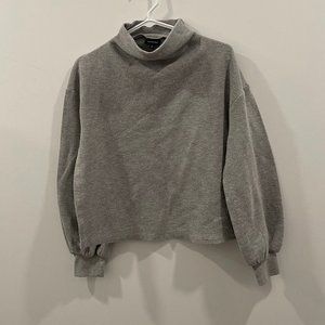 Gray loose fitting oversized turtleneck sweatshirt